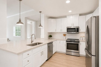 Tucked into the heart of Daniel Island, this 2-bedroom, 2.5-bath - photo 1