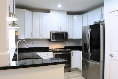 Tucked into the heart of Daniel Island, this 2-bedroom, 2.5-bath - photo 4