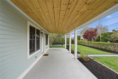 Escape to the highly sought-after Touisset Point area in this - photo 2