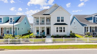 Experience effortless coastal living in this beautifully - photo 1