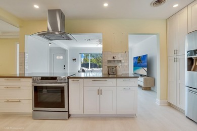 Welcome to this beautifully updated 4-bedroom, 2-bath pool home - photo 14