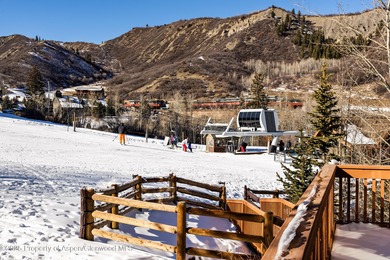 Ski directly onto Snowmass Mountain from this elegant residence