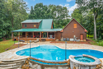 SMITH LAKE (SIMPSON SHORES):  A true mountain type retreat on - Lake Home For Sale in Bremen, Alabama