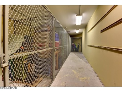 Extra storage just down the hallway and dedicated parking space - photo 34