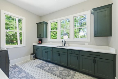 Positioned at the heart of Reynolds Lake Oconee on a prominent 1 - photo 37