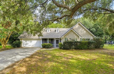 Set on a quiet street, 27 Telfair Drive offers a rare chance to - photo 1