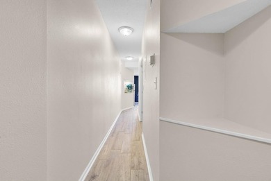 Welcome to Unit 207 at Beach Colony Resort, a charming 1-bedroom - photo 3