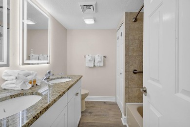 Welcome to Unit 207 at Beach Colony Resort, a charming 1-bedroom - photo 5