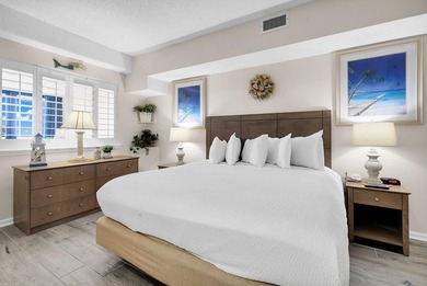 Welcome to Unit 207 at Beach Colony Resort, a charming 1-bedroom - photo 7