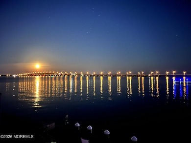 Wake up to refreshing bay breezes, and unwind with stunning - photo 3