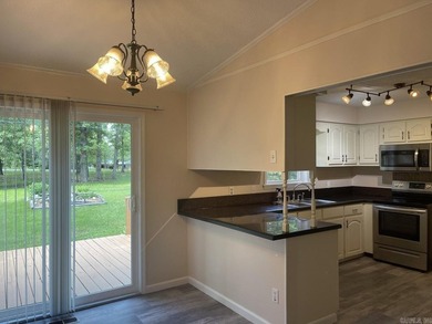 Refreshed, move-in-ready 3-bedroom 2-bath 1260 sq ft home with a - photo 20