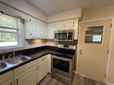 Refreshed, move-in-ready 3-bedroom 2-bath 1260 sq ft home with a - photo 24