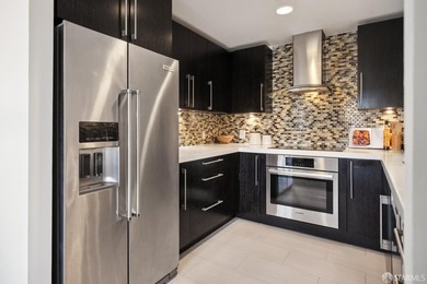 Residence 1001 at historic Hills Plaza is a warm, light-filled - photo 12