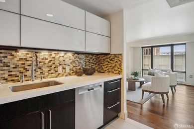 Residence 1001 at historic Hills Plaza is a warm, light-filled - photo 13