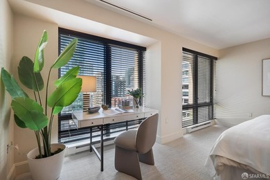 Residence 1001 at historic Hills Plaza is a warm, light-filled - photo 18