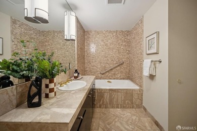 Residence 1001 at historic Hills Plaza is a warm, light-filled - photo 22
