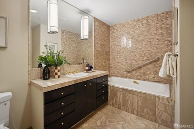 Residence 1001 at historic Hills Plaza is a warm, light-filled - photo 23