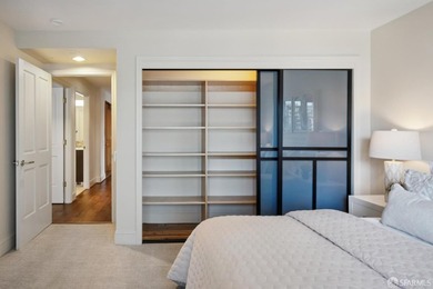 Residence 1001 at historic Hills Plaza is a warm, light-filled - photo 26
