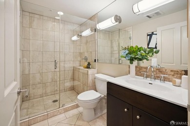 Residence 1001 at historic Hills Plaza is a warm, light-filled - photo 27