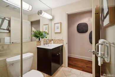 Residence 1001 at historic Hills Plaza is a warm, light-filled - photo 28