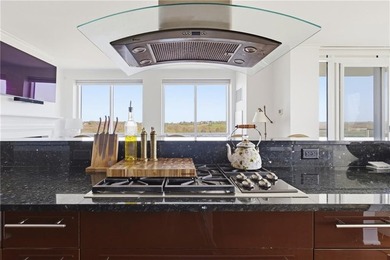 Set high above the shoreline in the prestigious Carnegie Tower - photo 8