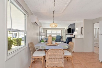 Located in a desirable 55+ community, this beautifully remodeled - photo 6