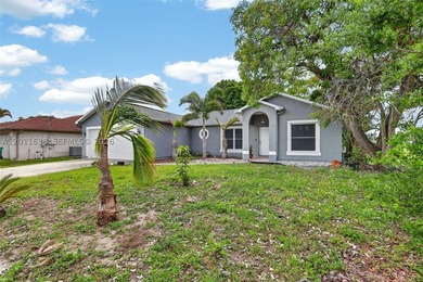 3936 SW Jarmer Rd, Port St. Lucie, FL 34953 Well-maintained - photo 3