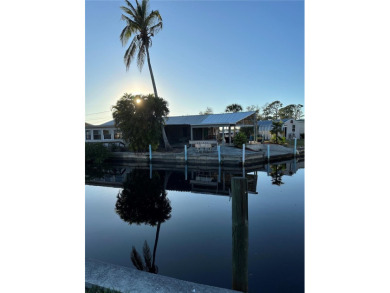 Port Charlotte Waterway Lakes Area Home Sale Pending in Port Charlotte Florida