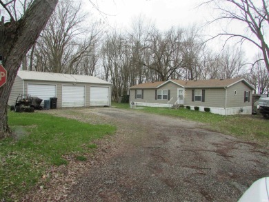 Great opportunity to live at the lakes without the cost.  This - Lake Home For Sale in Warsaw, Indiana
