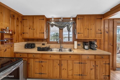 LAKEFRONT CHALET WITH A PRIVATE DOCK LOCATED IN A STR FRIENDLY - photo 24