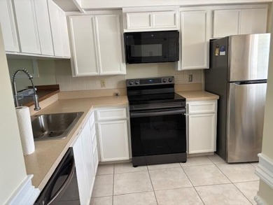 CHARMING 2ND FLOOR 2BEDROOM/2BATH CONDO OVERLOOKING GOLFCOURSE - photo 3