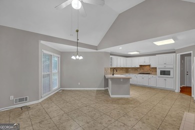 Welcome home to this beautifully maintained 3-sided brick ranch - photo 10