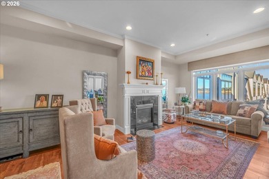 Experience elevated riverfront living in this top-floor