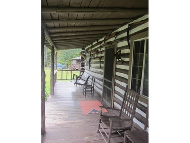 Turnkey, furnished, and unforgettable-this two-story log cabin - photo 12