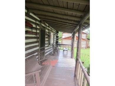 Turnkey, furnished, and unforgettable-this two-story log cabin - photo 13