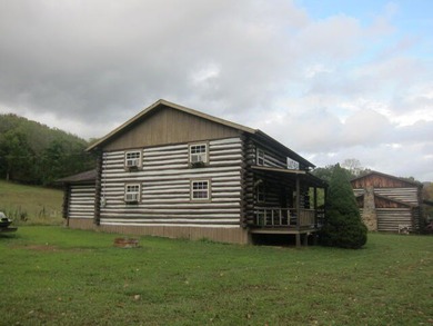 Turnkey, furnished, and unforgettable-this two-story log cabin - photo 14