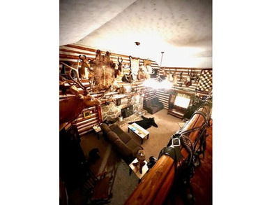 Turnkey, furnished, and unforgettable-this two-story log cabin - photo 32