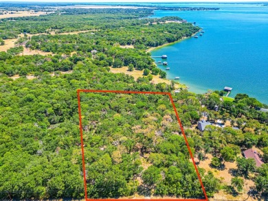 Heavily wooded 5 acre lot in North Shore Estates with a great - Lake Acreage For Sale in Kerens, Texas