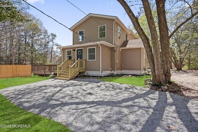 Welcome to this stunning, fully updated home set on just shy of - photo 3
