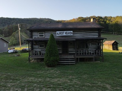 Turnkey, furnished, and unforgettable-this two-story log cabin - photo 44