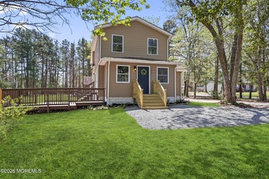 Welcome to this stunning, fully updated home set on just shy of - photo 4