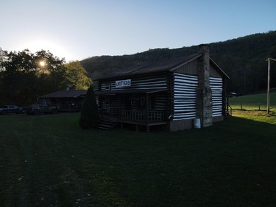 Turnkey, furnished, and unforgettable-this two-story log cabin - photo 45