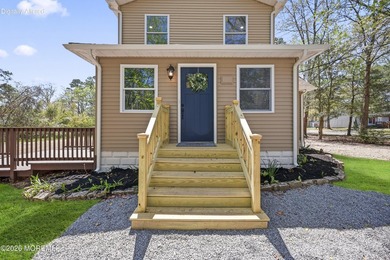 Welcome to this stunning, fully updated home set on just shy of - photo 5