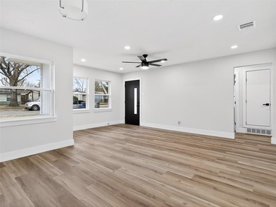 Fully renovated in 2025, this move-in ready 3-bedroom, 2-bath