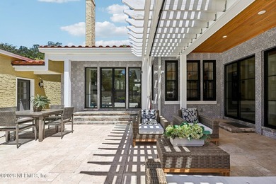 This exquisite block and stucco Mediterranean style home was - photo 42