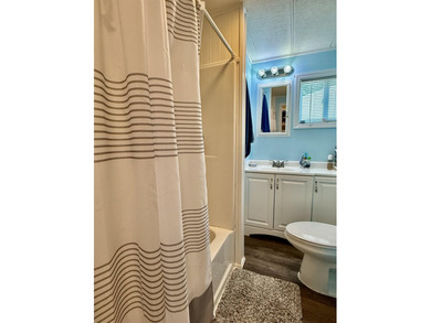 Welcome home to the corner-lot retreat in the desirable Ocean - photo 10