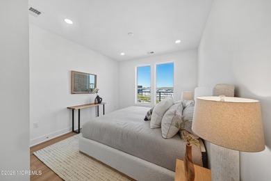 Experience coastal luxury in this stunning 3-bedroom residence - photo 18