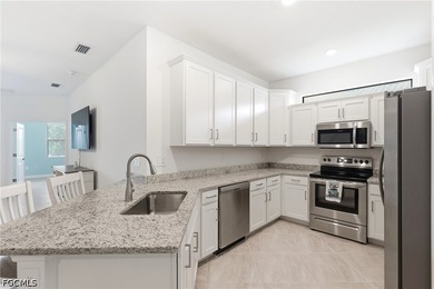 Wake up to peaceful lake views in this beautifully maintained 2 - photo 6