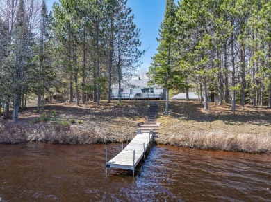 Turn-Key Year-Round Lakefront Haven! Set along the shoreline of - Lake Home Sale Pending in Minocqua, Wisconsin