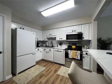 Welcome to the highly sought-after Coach Homes at Errol Estates! - photo 3